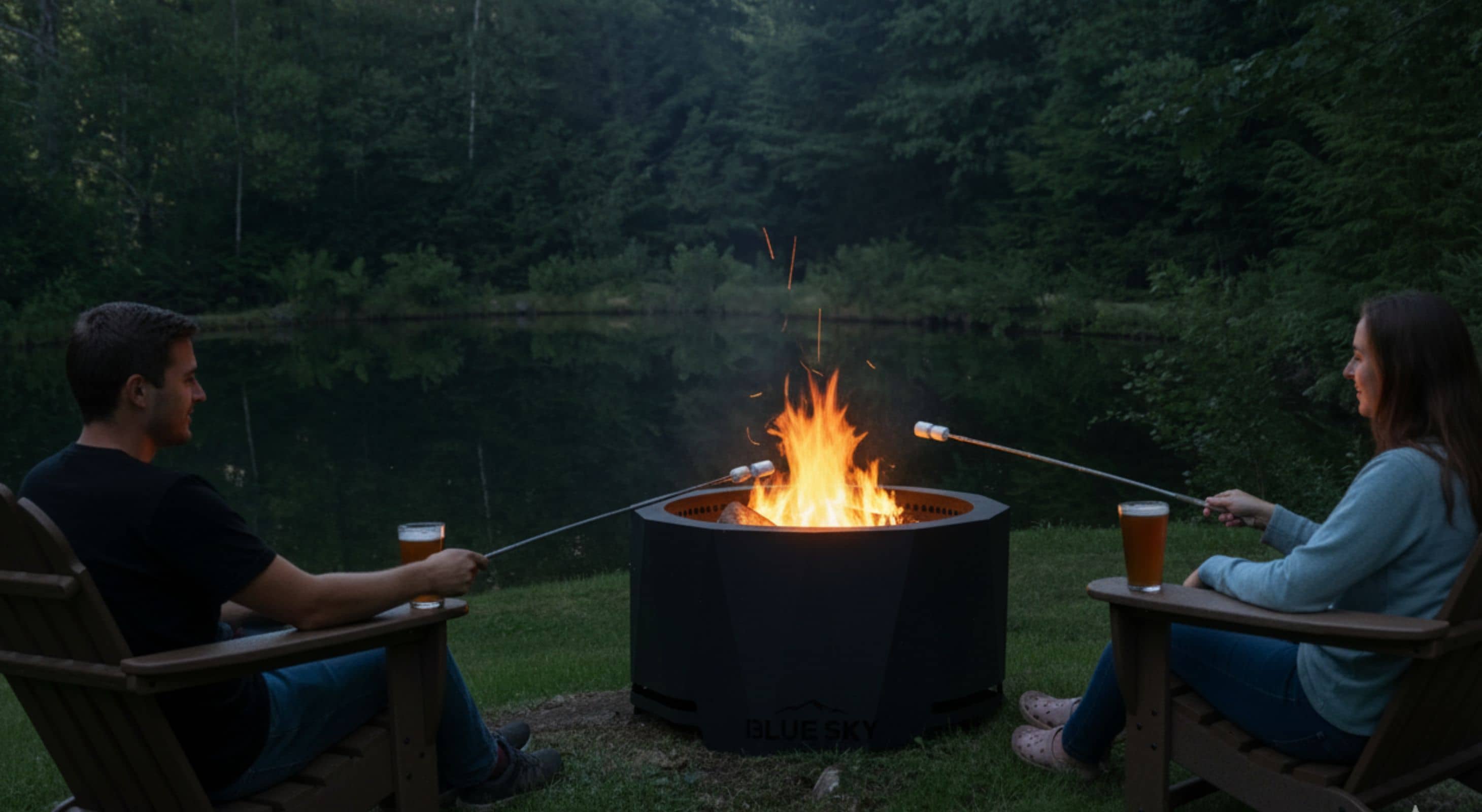 A couple roasting marshmallows over a firepit at White Horse Lodge in Vermont