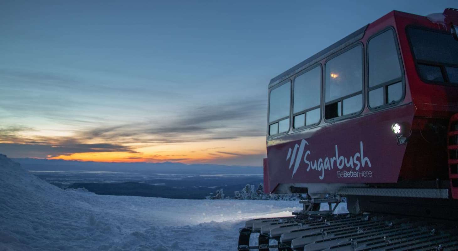 Sugarbush Resort, with snow-covered slopes in the foreground.