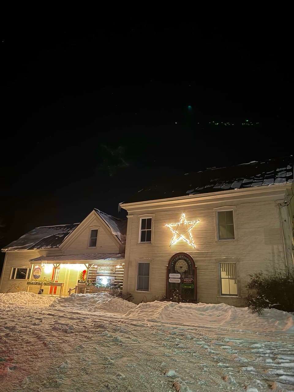 A business in Vermont decorated with a wooden Christmas Star, a Mad River Valley Tradition