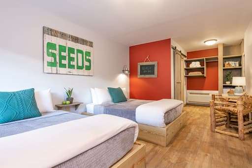 Two queen beds in a room at our Vermont lodging