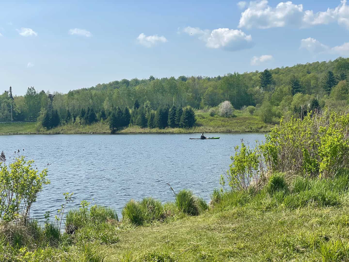 A kayaker paddling in Waitsfield, Vermont